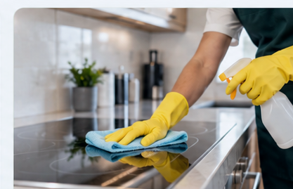 Kitchen surface receiving a detailed professional cleaning